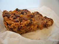 Grain-Free Fruitcake on slightly crumpled parchment paper