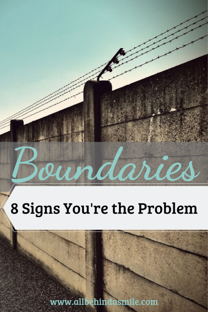 boundaries: 8 signs you're the problem over image of Wall topped with barbed wire