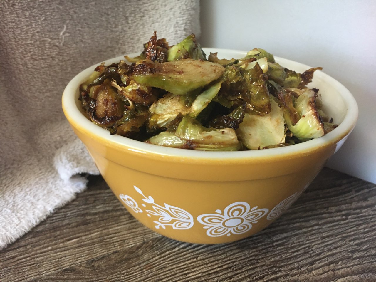 5 Ingredient Asian Inspired Brussels Sprouts in an old fashioned yellow bowl