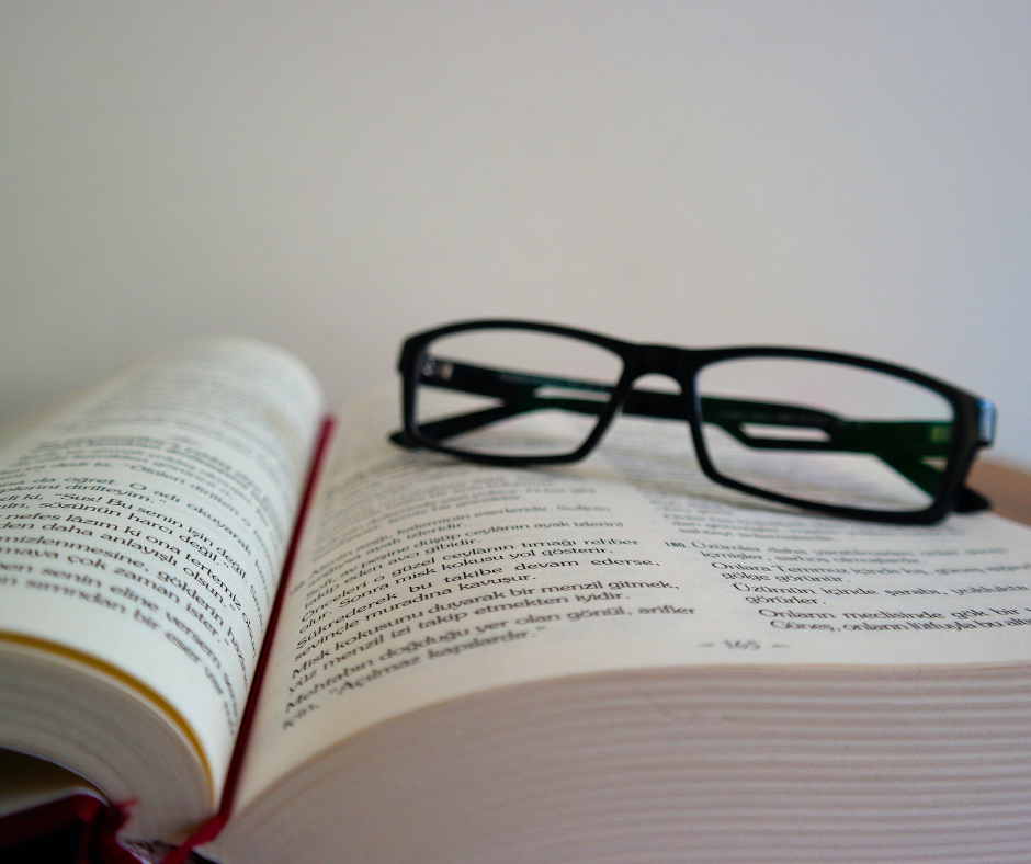 Glasses resting on an open book