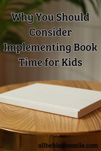 Image of a blank white book on a wooden table top with the text Why You Should Consider Implementing Book Time for Kids