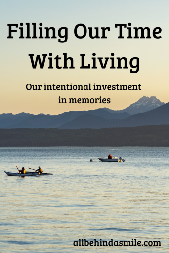 Image of kayaking on a large body of water with the text filling our time with living our intentional investment in memories