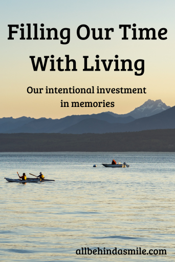 Filling Our Time with Living Image of kayaking on a large body of water with the text filling our time with living our intentional investment in memories
