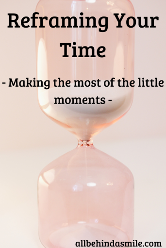 Pale pink hourglass with white sand falling from the top with the text Reframing Your Time - making the most of the little moments -